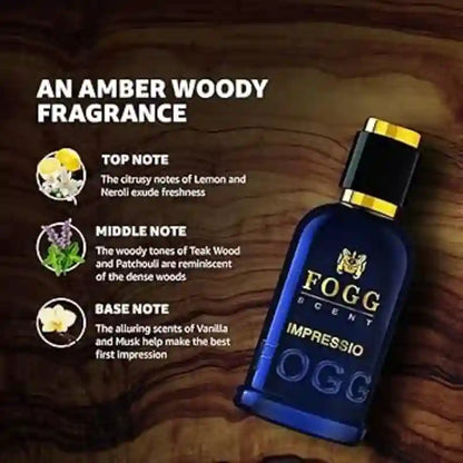 A bottle of Fogg Scent Impressio Oog amber woody fragrance shown on a dark wood background with text describing the scent notes.