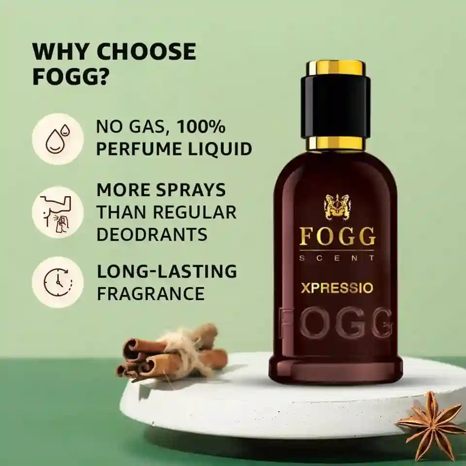 Fogg Scent Xpressio perfume bottle in a dark amber-brown glass bottle with a gold cap, displayed on a white pedestal with cinnamon sticks and star anise against a sage green background with promotional text.