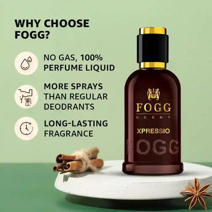 Fogg Scent Xpressio perfume bottle in a dark amber-brown glass bottle with a gold cap, displayed on a white pedestal with cinnamon sticks and star anise against a sage green background with promotional text.