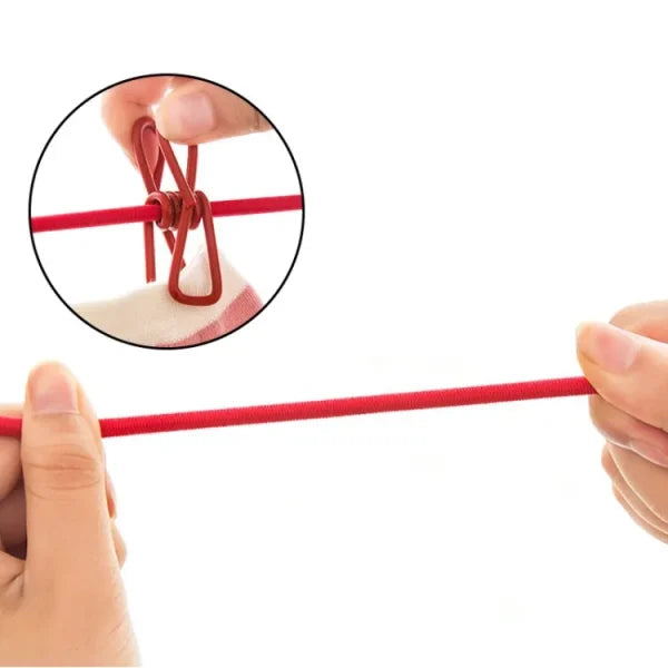 Red rubber band being stretched with a close-up inset showing a knot.