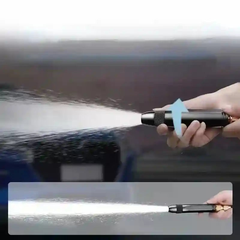 Person using a high-pressure washer to clean a car