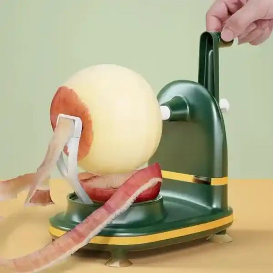 Apple peeler being used on a green background