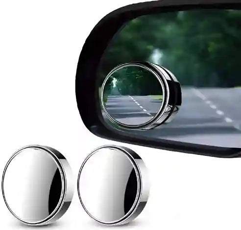 Round car mirror with a blurred road background