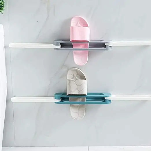 Two pairs of shoes on a white shelf with a light gray background