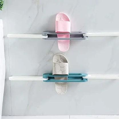 Two pairs of shoes on a white shelf with a light gray background