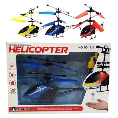 Toy helicopter set with colorful blades and a packaging box displaying text and images of the product.