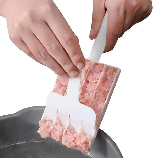 Person using a meat tenderizer tool on ground meat.