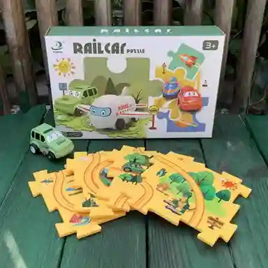 Railcar puzzle set with packaging and pieces on a wooden surface