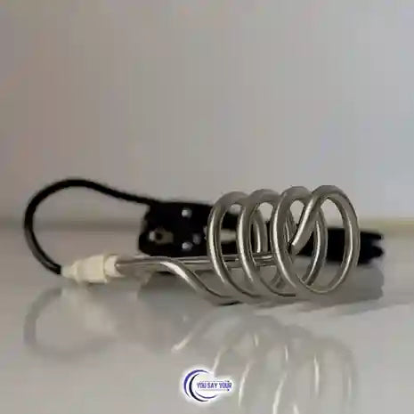 Metal heating element with coiled design on a white background