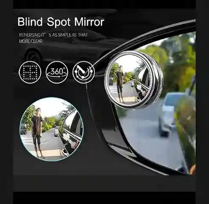 Blind spot mirror with car reversing scenario on a black background
