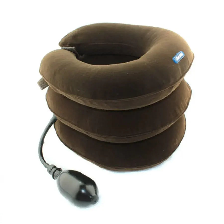 Brown inflatable neck pillow with pump on a white background