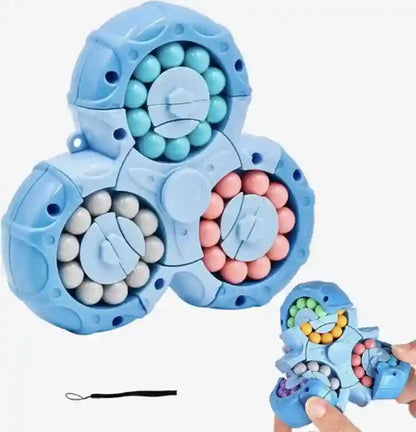 Blue fidget spinner toy with multicolored beads on a white background