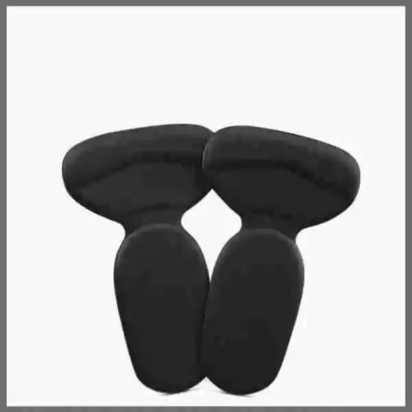 Black foot-shaped objects on a white background