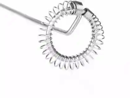 Silver coil spring on a white background