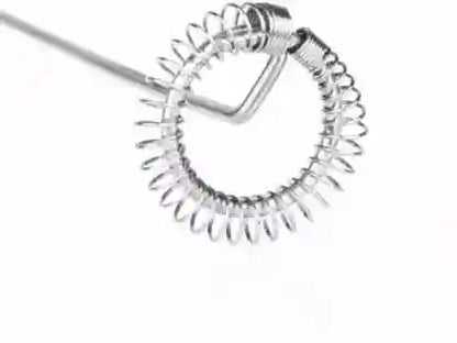 Silver coil spring on a white background