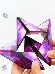 Fidget spinner with a galaxy design held in hand