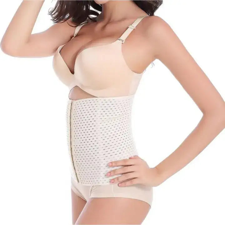 Woman wearing a beige compression garment on a white background