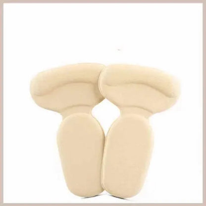 Beige U-shaped travel pillow on a white background
