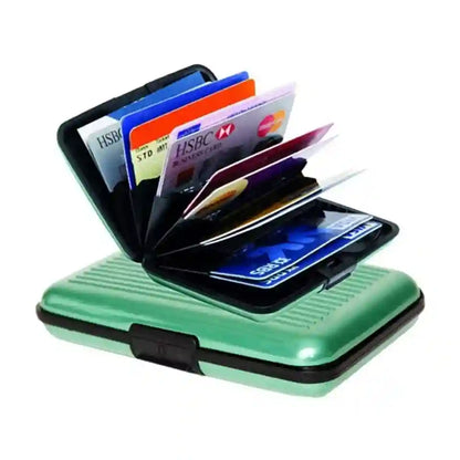 A mint green metal wallet shown open, containing several credit cards, on a plain white background.