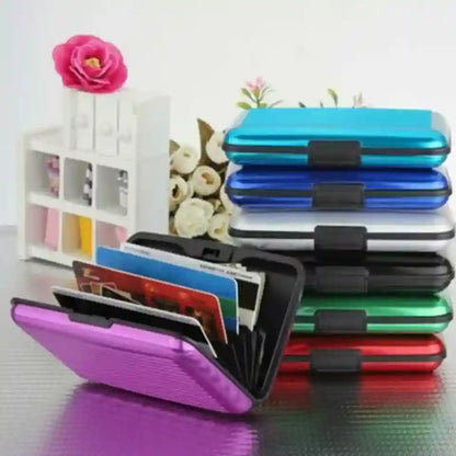Stack of colorful card holders with a floral and decorative background