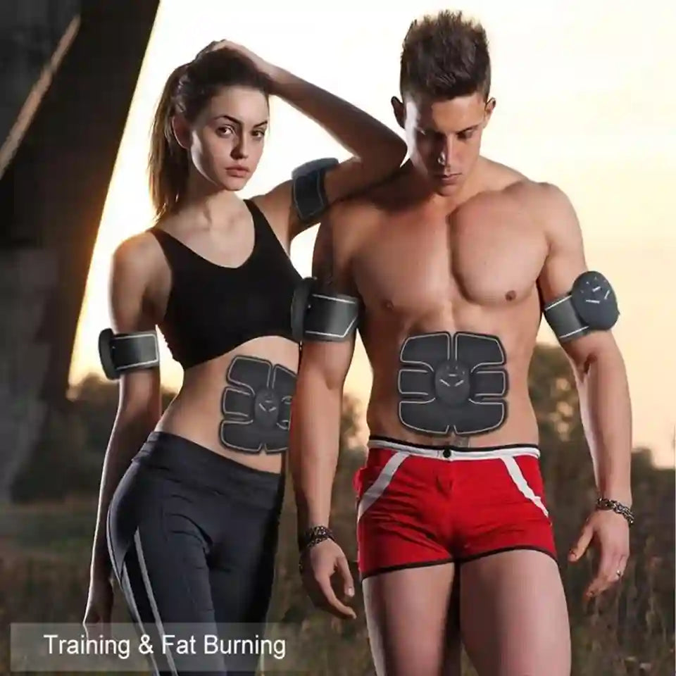 Two fit adults outdoors at sunset wearing abdominal training devices and armbands, with the text 'Training & Fat Burning' at the bottom left.