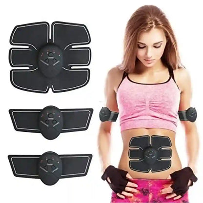 Black abdominal trainer muscle stimulator pads shown both individually and worn by a woman in a pink sports bra and gloves, on a white background.