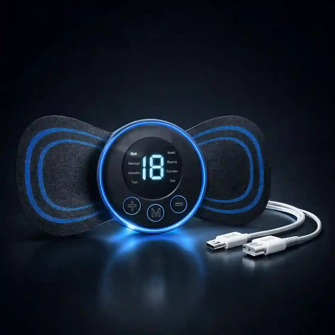 A TENS unit muscle stimulator device with two black electrode pads and a central circular display glowing with blue light, shown on a dark reflective surface with a white USB charging cable.