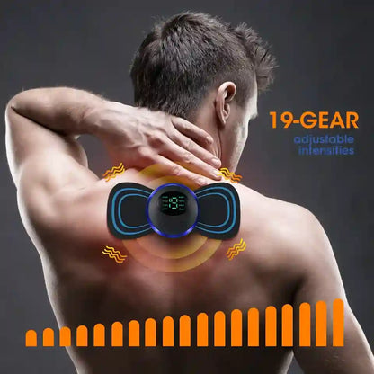 Man using a back massager with digital display on a dark background