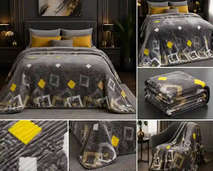 A dark gray and black geometric patterned throw blanket with yellow and white accents, shown in a bedroom setting on a bed, folded, and draped over an armchair.