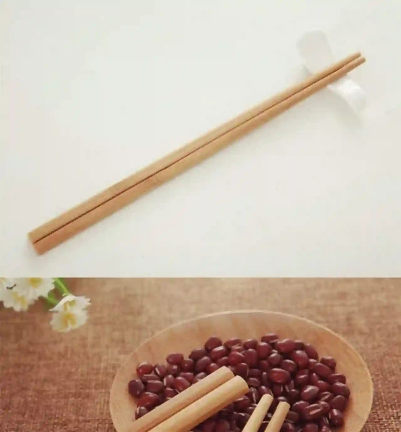 Wooden chopsticks on a white surface with a close-up of beans in a wooden bowl.