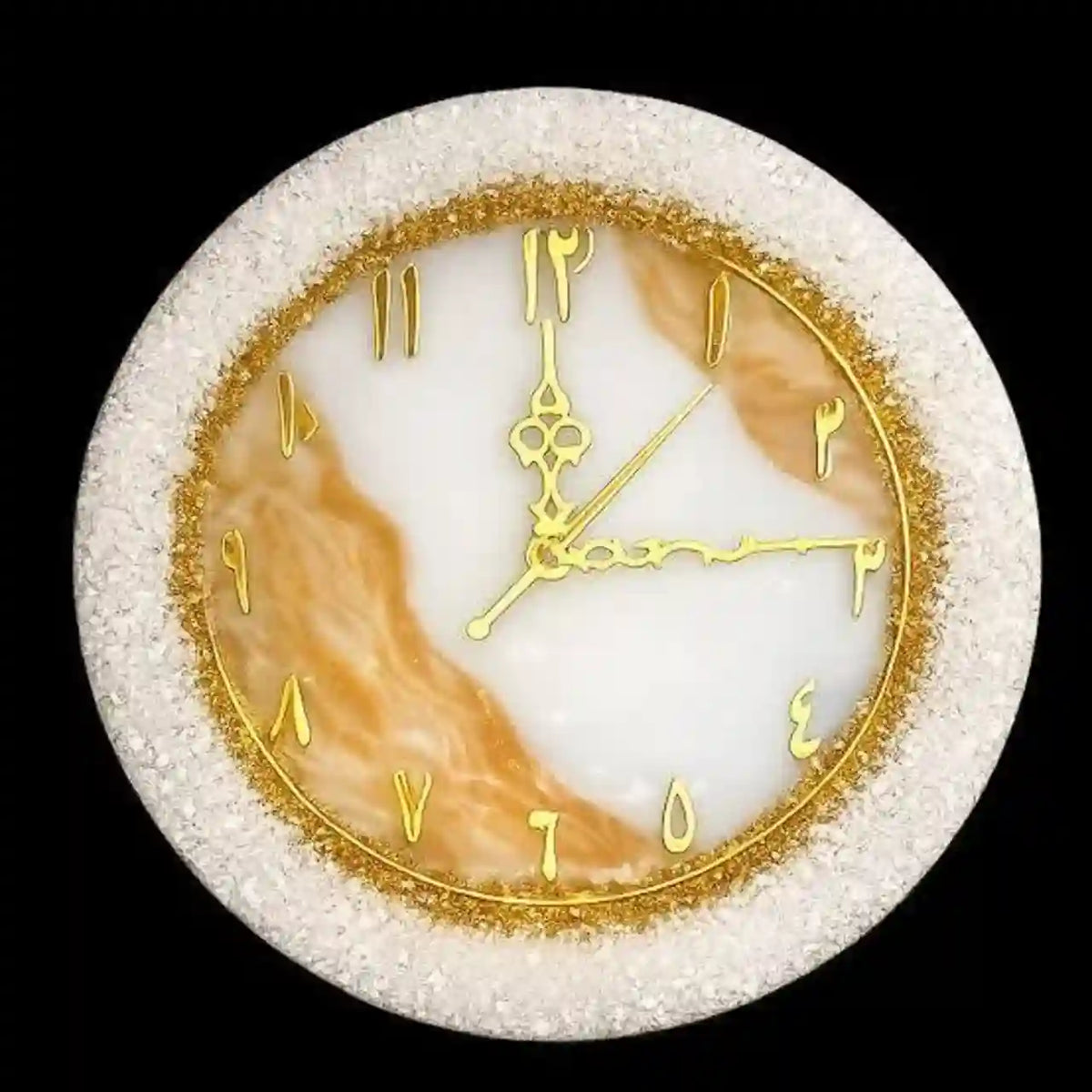 A round decorative wall clock with a textured white stone-like outer frame, a white and tan marbled dial, gold Arabic numeral hour markers, and ornate gold hands, shown against a solid black background.