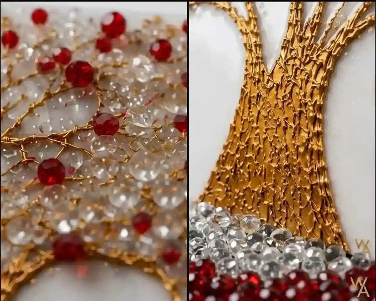 Close-up of a decorative tree design made with gold-tone wire branches, clear faceted rhinestones, and red faceted beads on a white background.