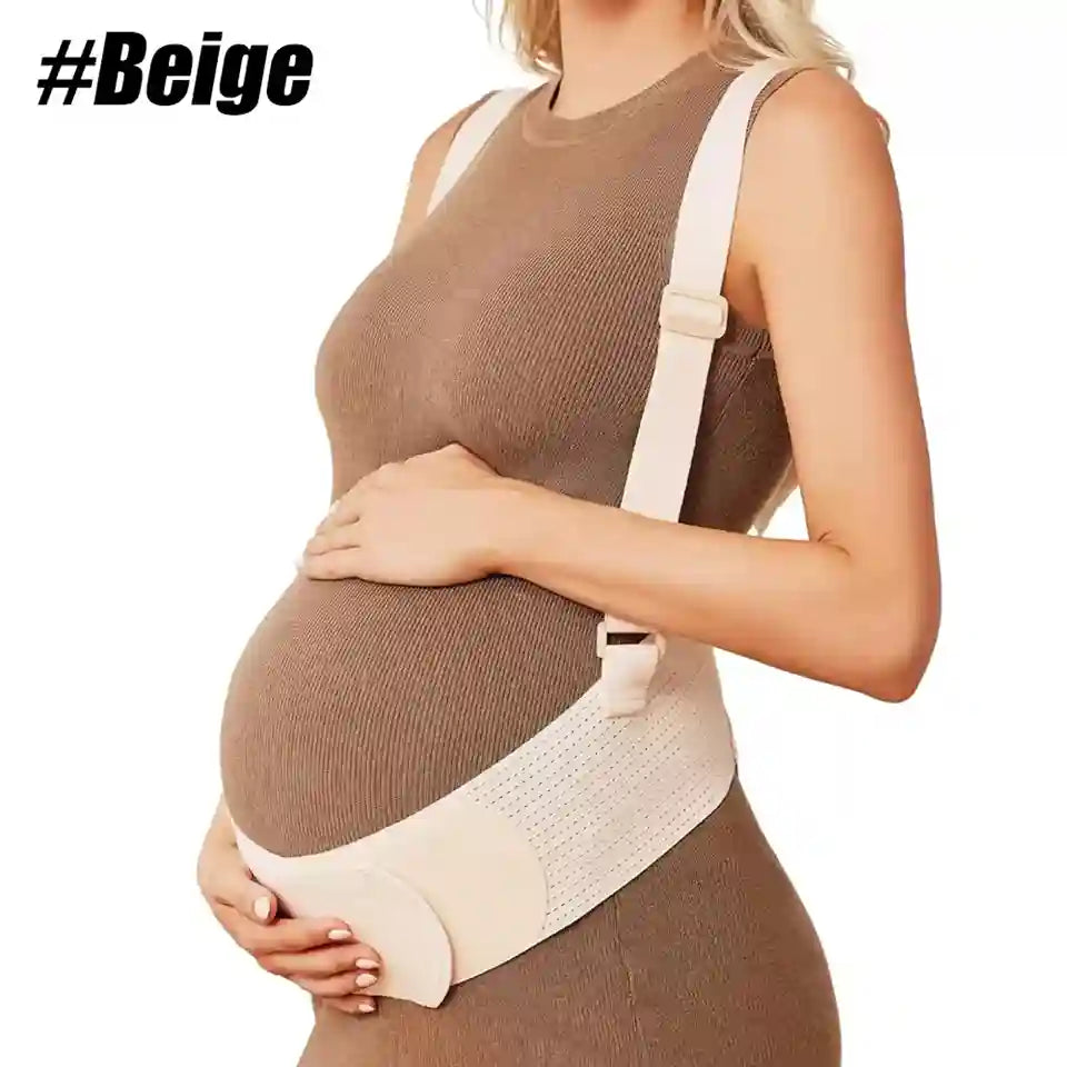 A pregnant model wearing a beige maternity support belt over a brown ribbed dress, shown from the chest down against a white background with the text '#Beige' in the top-left corner.