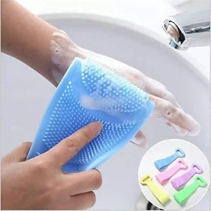 A blue silicone hand scrubber being used on a soapy hand under a faucet, with a small inset showing the scrubber in multiple colors.