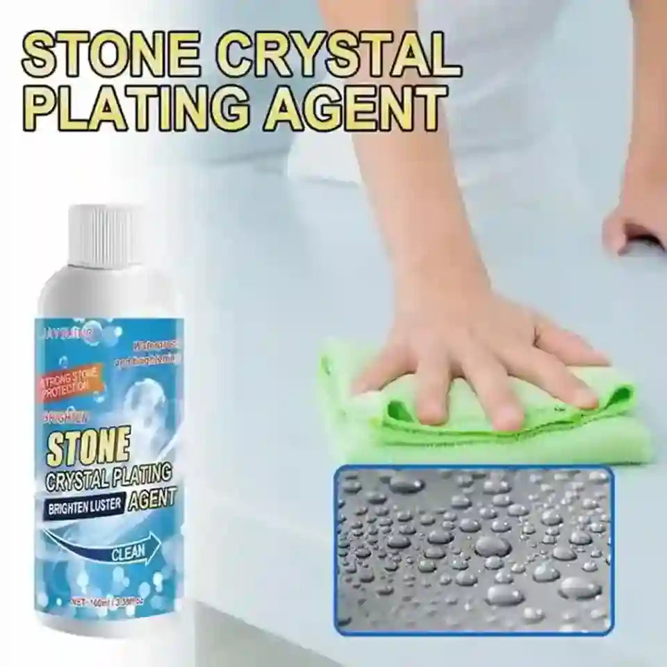 A bottle of stone crystal plating agent shown next to a hand wiping a light-colored surface with a green cloth, with an inset showing water droplets on a treated surface and large text reading 'STONE CRYSTAL PLATING AGENT'.