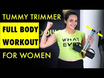 A woman in a gym holding a tummy trimmer exercise tool, wearing a neon green graphic t-shirt. The image features large yellow text overlays reading 'TUMY TRIMMER', 'FULL BODY WORKOUT', and 'FOR WOMEN' on a black background.