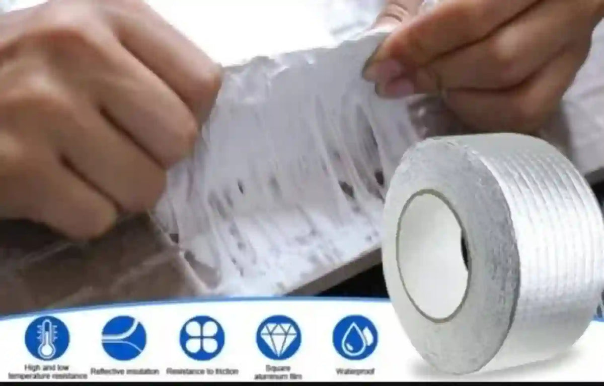 Person applying silver reflective tape to a surface with product features displayed below.