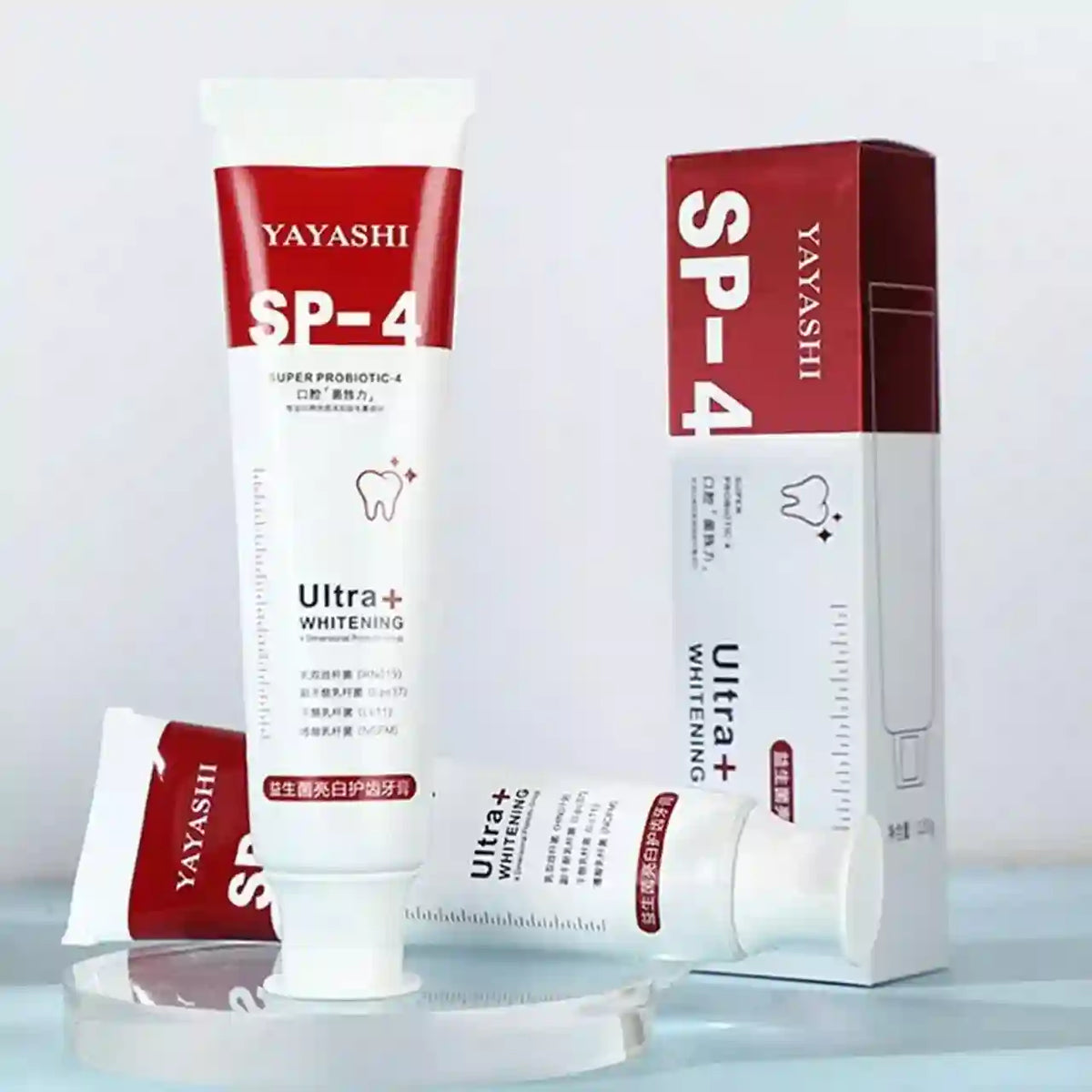 YAYASHI SP-4 Ultra Whitening toothpaste with packaging on a light gray background