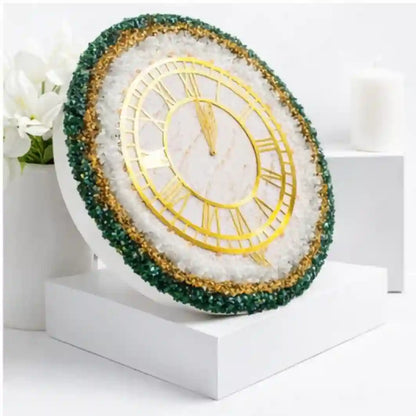 Mehmat Resin Collection Decorative clock with gold hands and green gemstone trim on a white stand.