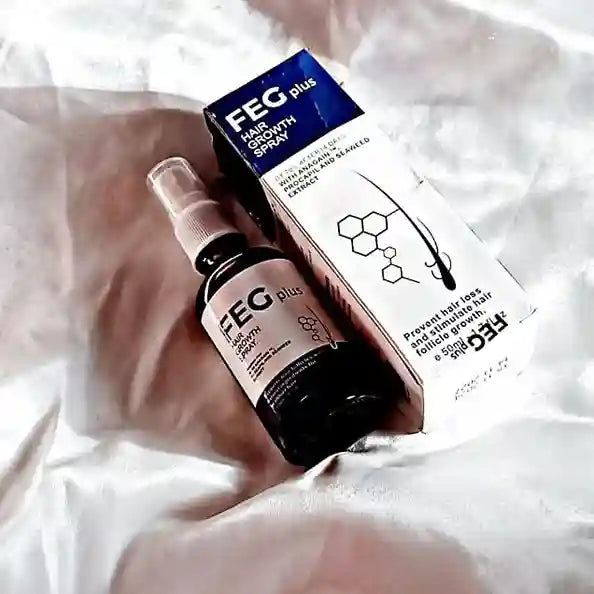 FEG Plus hair growth spray bottle and box on a white background